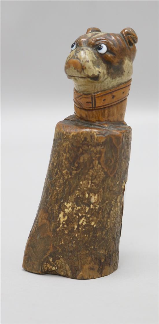 A painted wood dogs head 11cm
